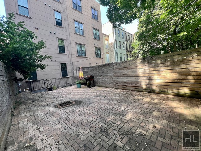 Building Photo - Ground level brownstone duplex w/ private ...