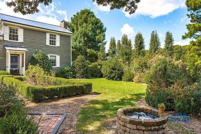Building Photo - UNIQUE RENTAL HOME ON 1 LANDSCAPED ACRE IN...