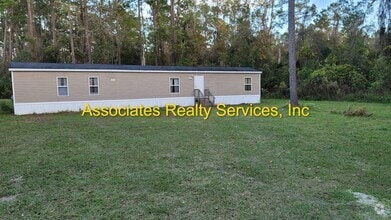 Building Photo - 5898 NW 218 Ave