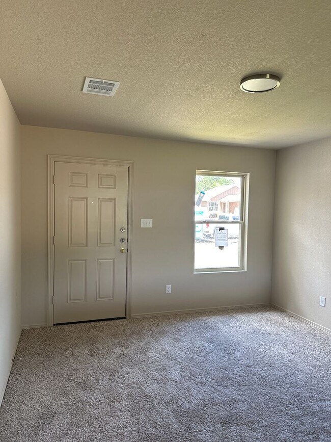 Building Photo - Bryan - BRAND NEW HOUSE -3 bedrooms / 2 bath / 2 car garage with fenced in yard.