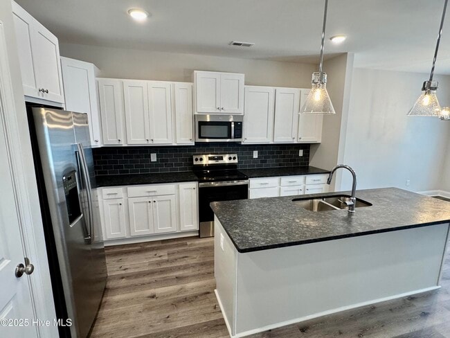 Foto del edificio - 1404 Hartley Ln