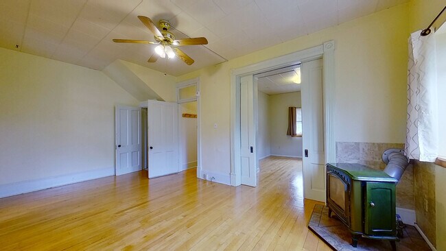 Living Room and Bedroom with Pocket Doors - 509 Madison Ave
