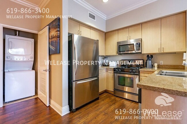 Building Photo - 2 bed 2 bath furnished residence located i...