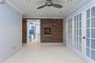 Building Photo - E 11th St