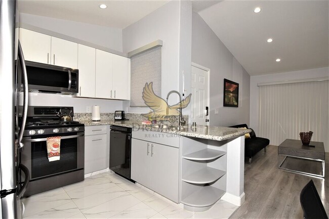 Building Photo - 5415 W Harmon Ave