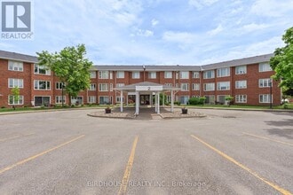 Building Photo - 2-202 Heritage Way