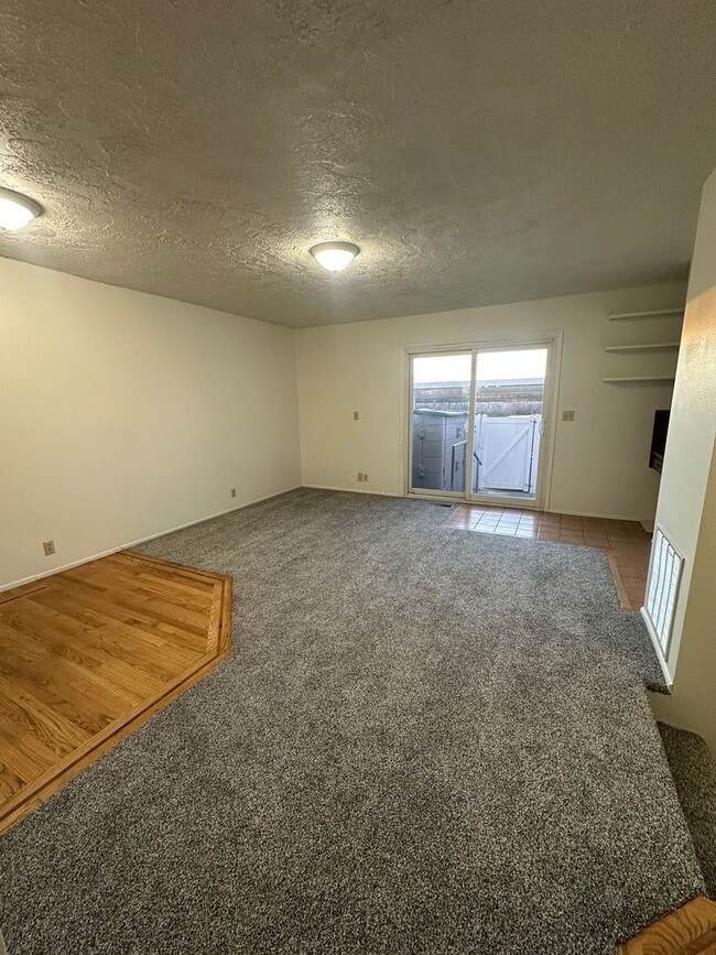 Building Photo - $500 OFF OF FIRST MONTHS RENT!!! - Spacious, three level, 4 Bed 2.5 bath Townhome in Ammon right ...