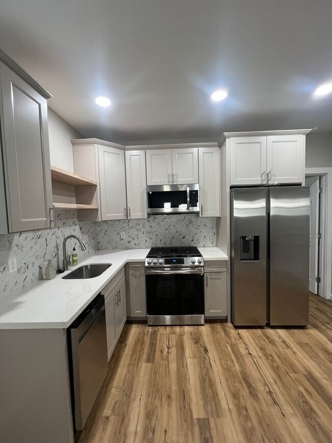 Photo - Split AC's In each room. Wet Bar. Spacious House