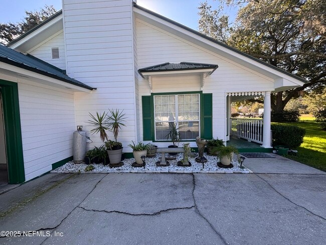 Foto del edificio - 15813 Butch Baine Dr