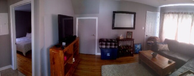 The living room (furnished by tenant) - 2084 Poplar St