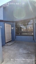 Building Photo - 3646 N 69th Ave
