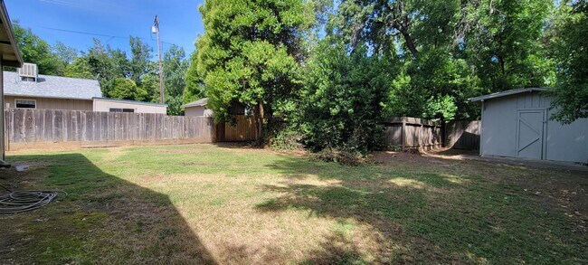 Building Photo - Spacious 2 Bedroom With Carport and Storag...