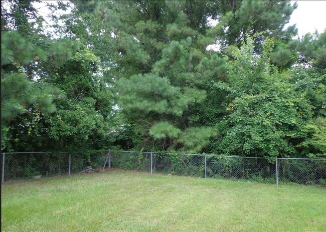 Building Photo - Two Bedroom Two Full Bathroom End Unit Tow...