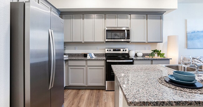 Building Photo - The Meadows at Tutt Village Townhomes