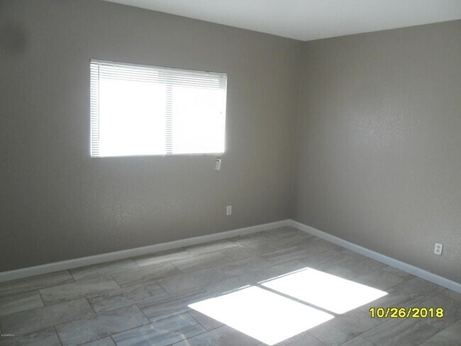 Building Photo - El Mirage Home with Tile Flooring Throughout