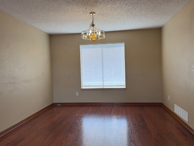Building Photo - ~Available Now~  Beautiful Four Bedroom Home with Fireplace, Private Yard & Luxurious Primary Suite!