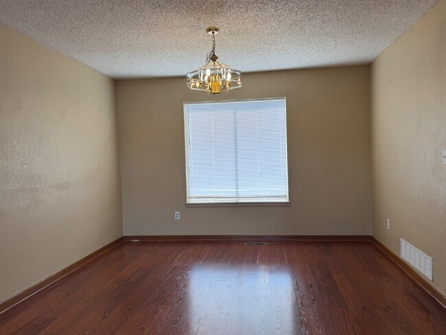 Photo - ~Available Now~  Beautiful Four Bedroom Home with Fireplace, Private Yard & Luxurious Primary Suite!