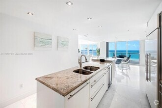 Building Photo - 3801 Collins Ave