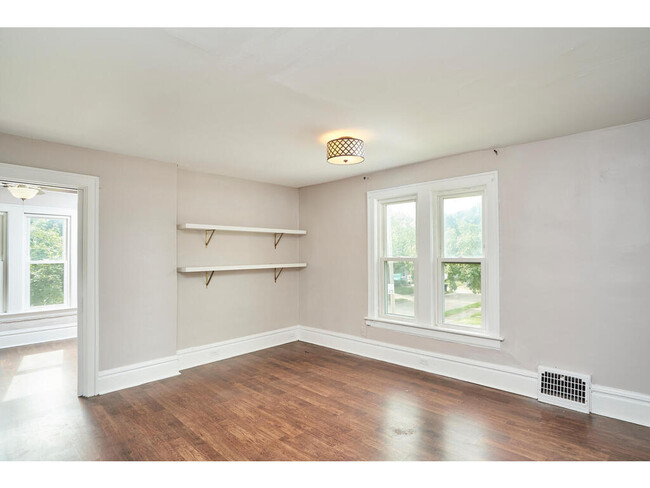 Living Room with built-in shelves - nice and bright! - 1214 Beardsley St