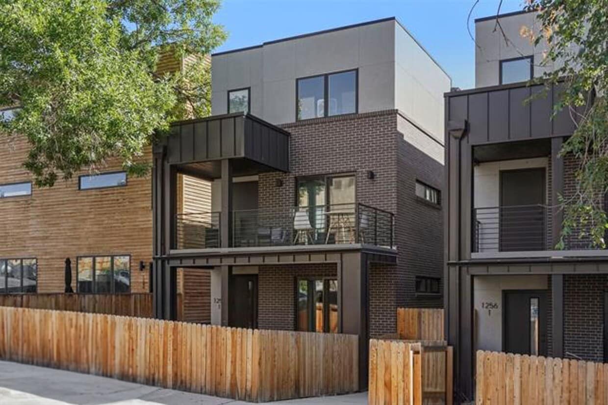 Photo - 1258 Newton St Unit 1- 4-Bed Townhome with Finished Basement & Private Garage + 1 Month Free!
