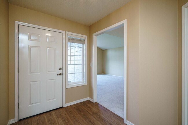Building Photo - Beautifully Landscaped 1/4 acre with Well ...