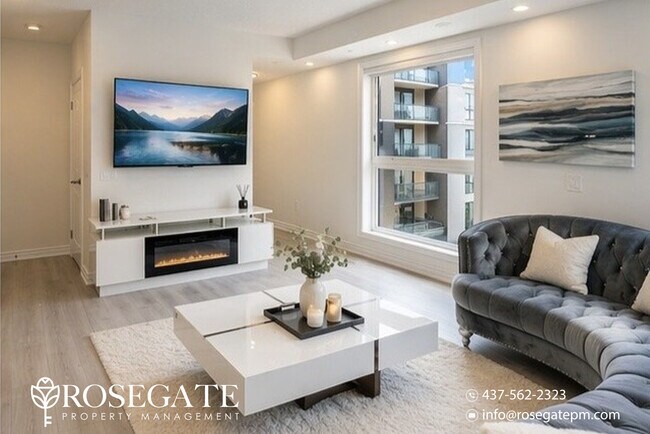 Photo du bâtiment - Spacious Corner Condo-Townhouse with Wraparound Balcony & Garage – Oakville