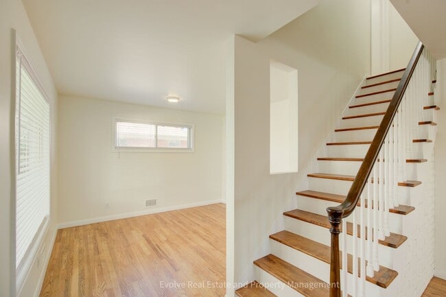 Building Photo - Evolve Real Estate: Welcome to This Spacio...