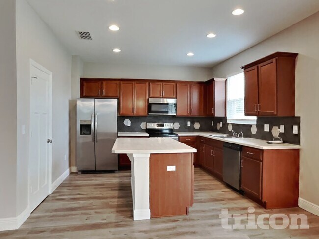 Building Photo - 7105 Feather Wood Dr