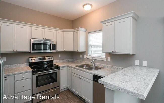 Building Photo - 4 br, 3 bath House - 1106 Manitou Trail