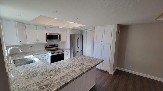 Building Photo - 7909 E Pecos Ln