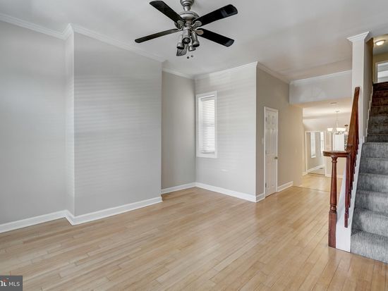 Living Room with Ceiling Fan - 105 N Patterson Park Ave