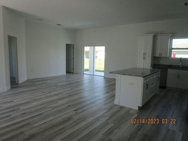 Building Photo - Like New 3/2/2 w/ Den Avail Now in NE Cape...