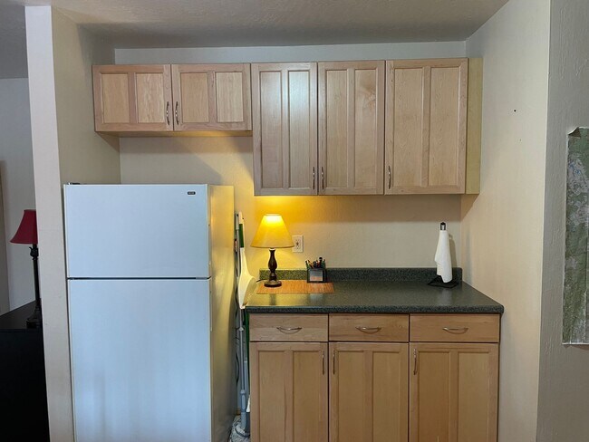 Building Photo - Upstairs Condo - 2 Bedroom, 1 Bath with Ca...
