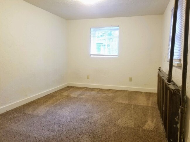 Building Photo - Super Spacious Three Bedroom on Bates Street! Deck & Patio! Washer & Dryer Included! Call Today!