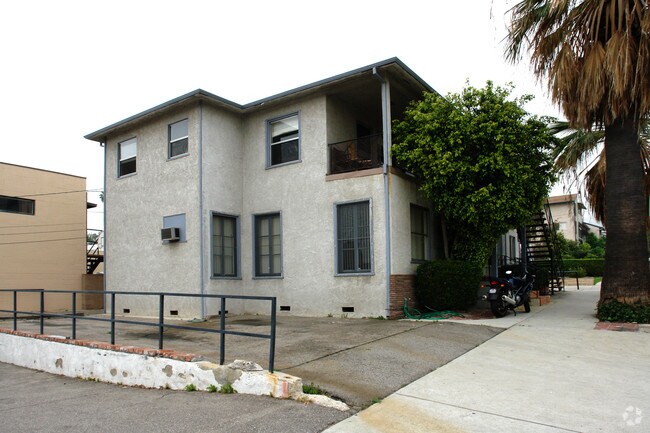 Building Photo - 4 Unit  Apts + 1 Commercial Unit