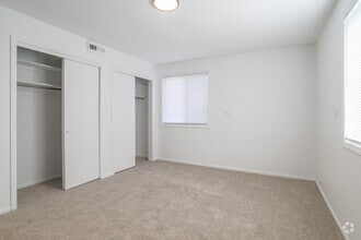 2 BR, 1 BA - The Agave - First Bedroom - ReNew Millbrook Apartment Collection