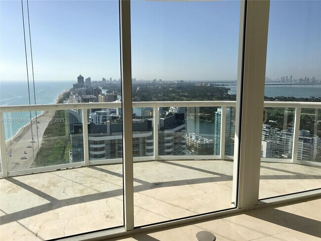 Building Photo - 6365 Collins Ave