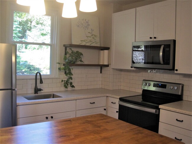 Tall cabinets for plenty of storage space! - 2332 Los Angeles Ave