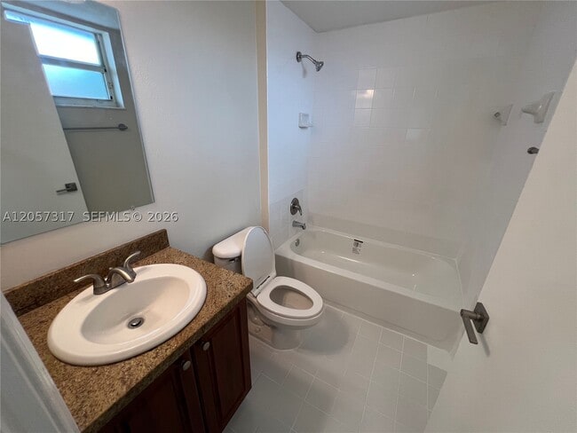 Building Photo - 202 Sable Palm Way