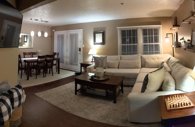 Another view of the open layout for the living room and dining room area. - 205 Fieldbrook Dr