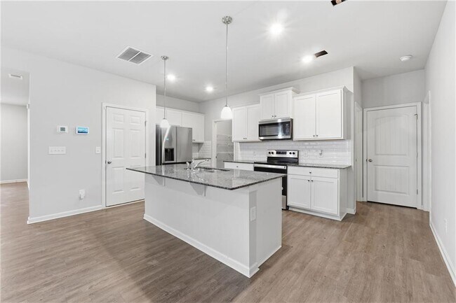 Foto del edificio - 6615 Bluffview Dr