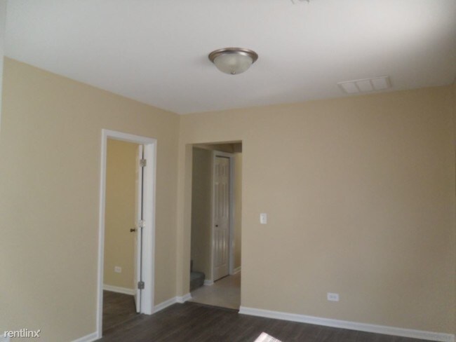 Building Photo - 3 br, 2 bath House - 4416 W Wilson Ave