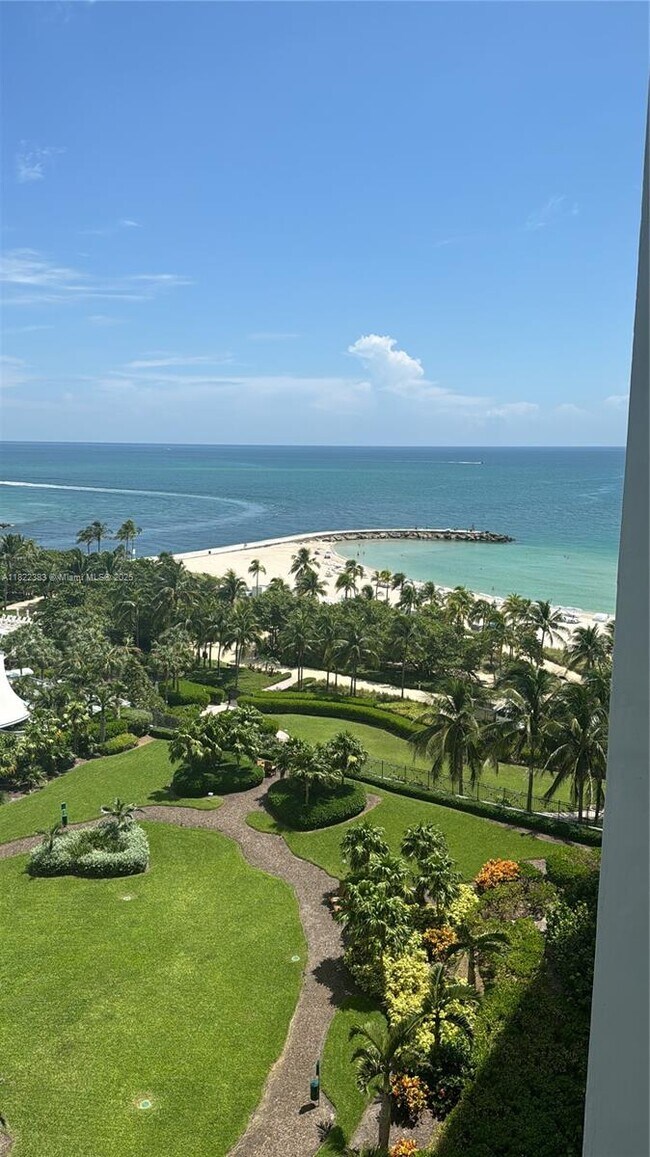 Building Photo - 10275 Collins Ave
