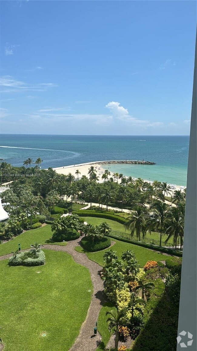 Building Photo - 10275 Collins Ave