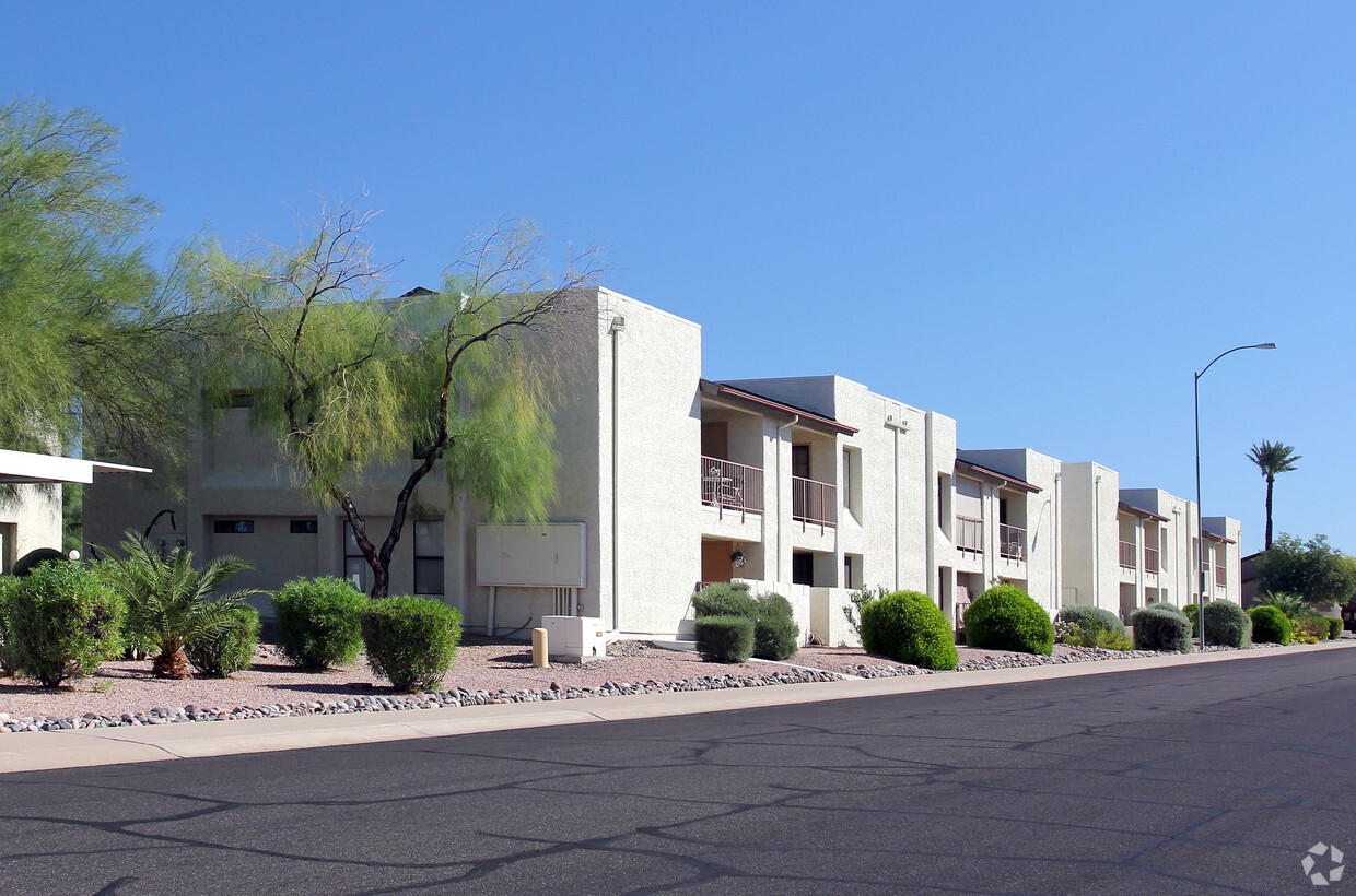 Building Photo - Village At Apache Wells