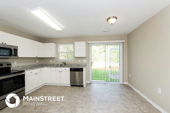 Foto del edificio - 7147 Wandering Creek Dr