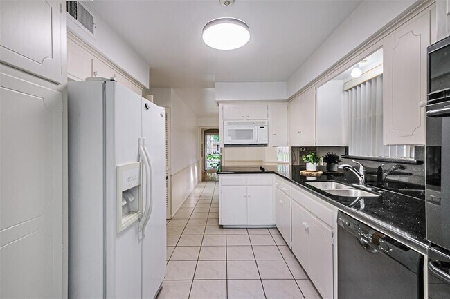 Foto del edificio - 6122 Piping Rock Ln