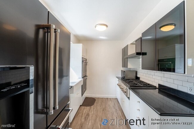 Building Photo - 4 br, 2 bath House - 10427 63rd Ave S, Sea...