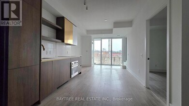 Building Photo - 1285 Queen St E