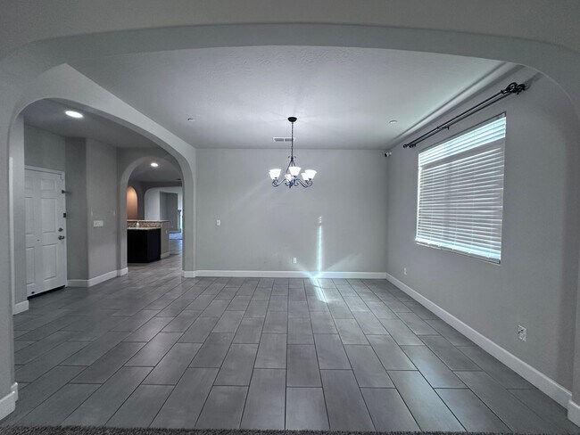 Building Photo - Spacious Tulare home coming soon!